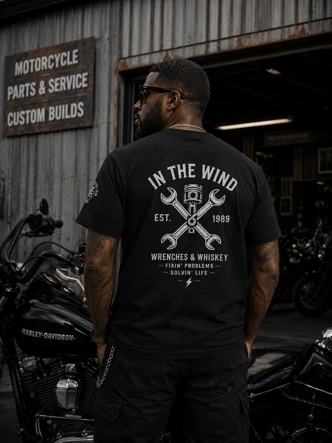 In The Wind™ Wrenches & Whiskey Graphic T-Shirt – Vintage Black. 4 Color Options