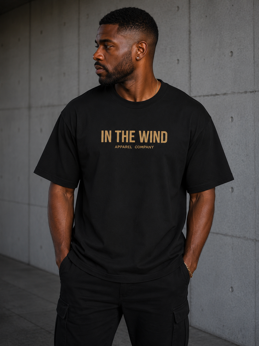 In The Wind™ Black Label Premium T-Shirt – “No Destination. Just Motion.”                                 Size up
