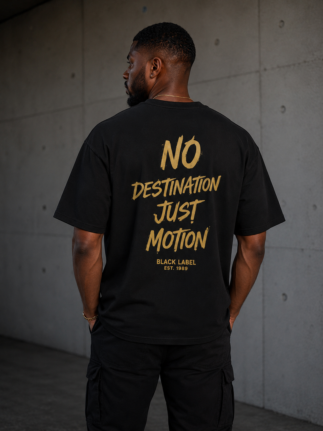 In The Wind™ Black Label Premium T-Shirt – “No Destination. Just Motion.”                                 Size up